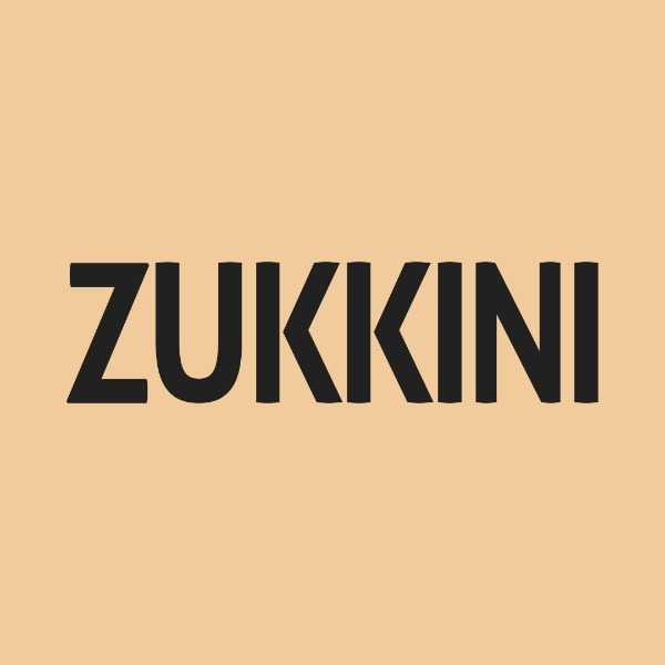 Zukkini logo — charcoal wordmark on sandy peach